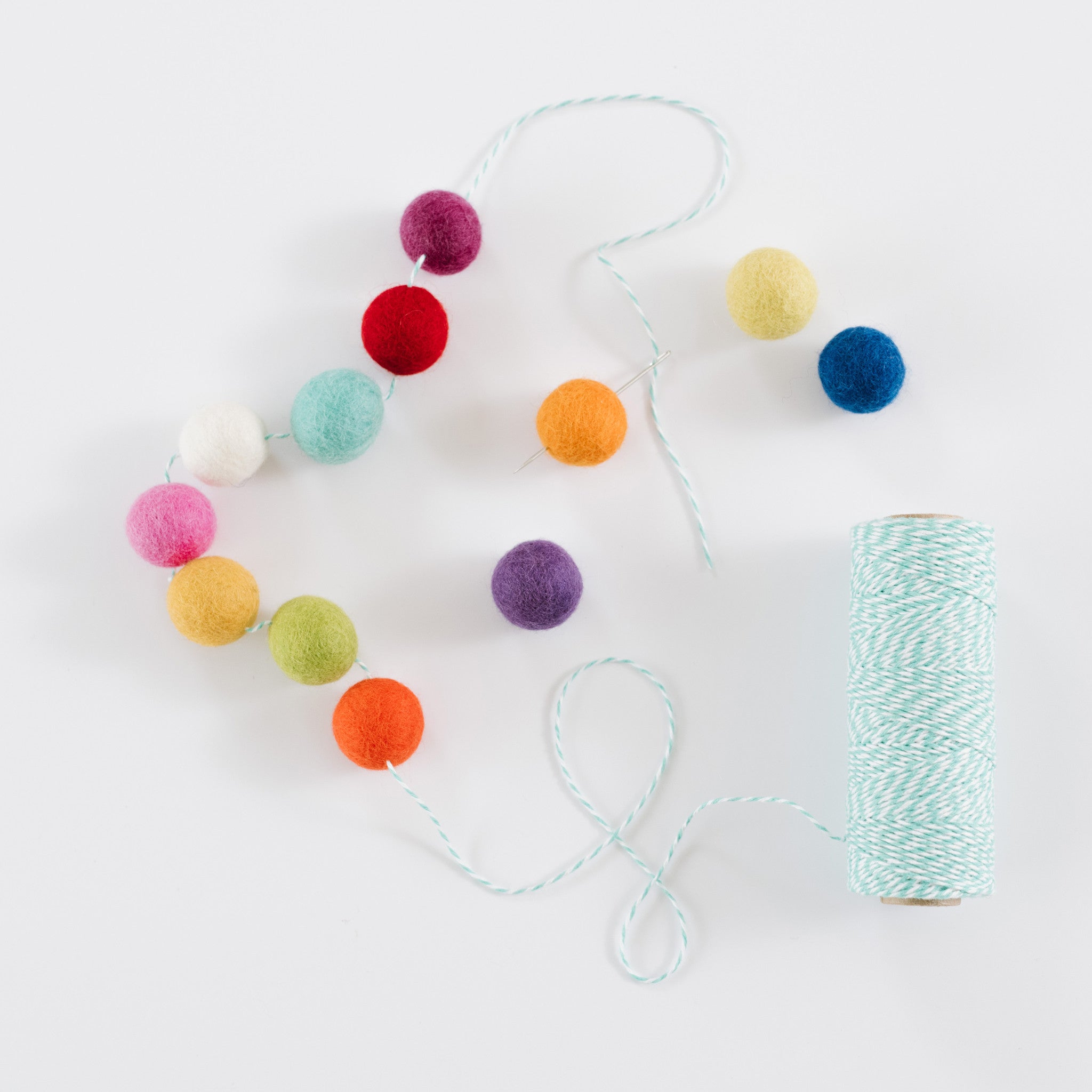 The Perfect Needle for Stringing Felt Balls from Hello Maypole